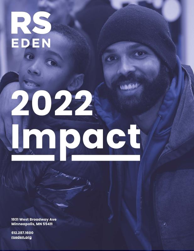 2022 Impact Report cover; man with child smiling