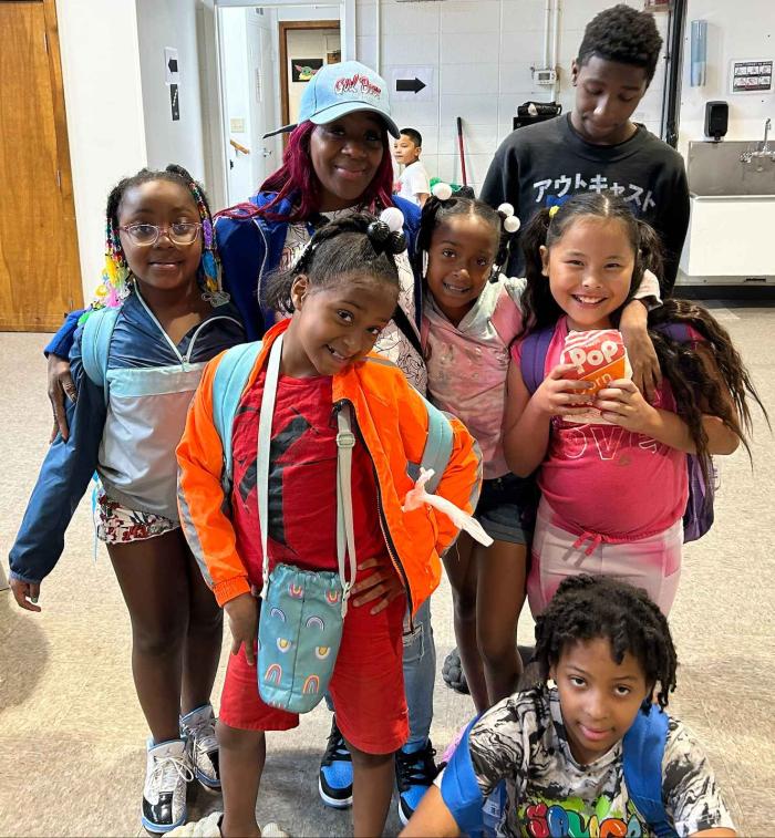 Group of students excited to attend the next year of school.