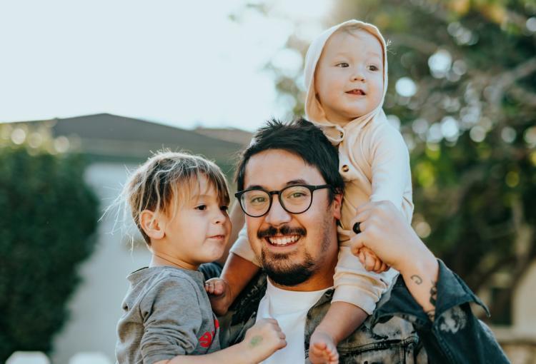 Parent with two kids.