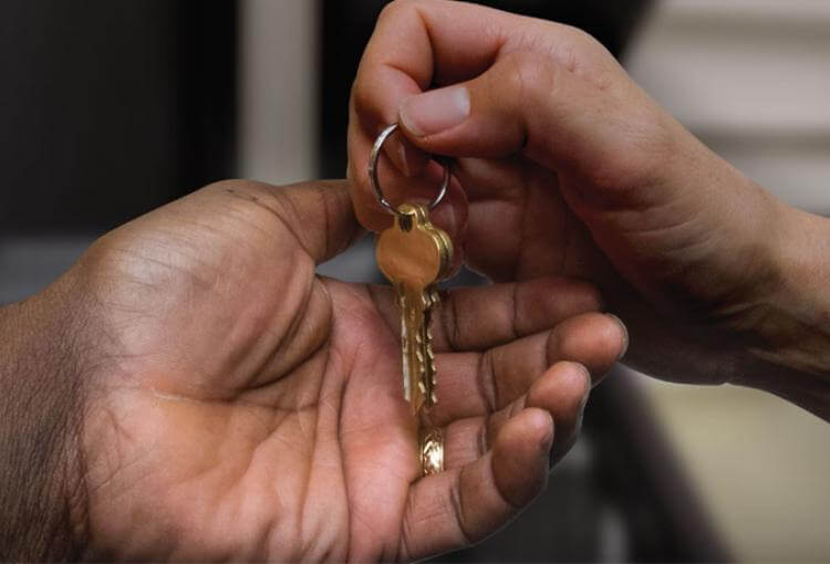 mother playing with her two kids in a park and sunshine